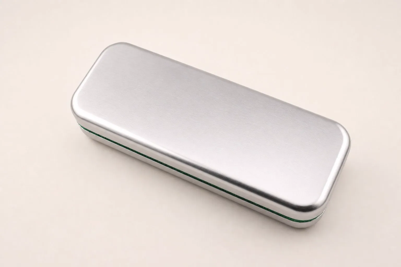 Brushed metal spectacle case.