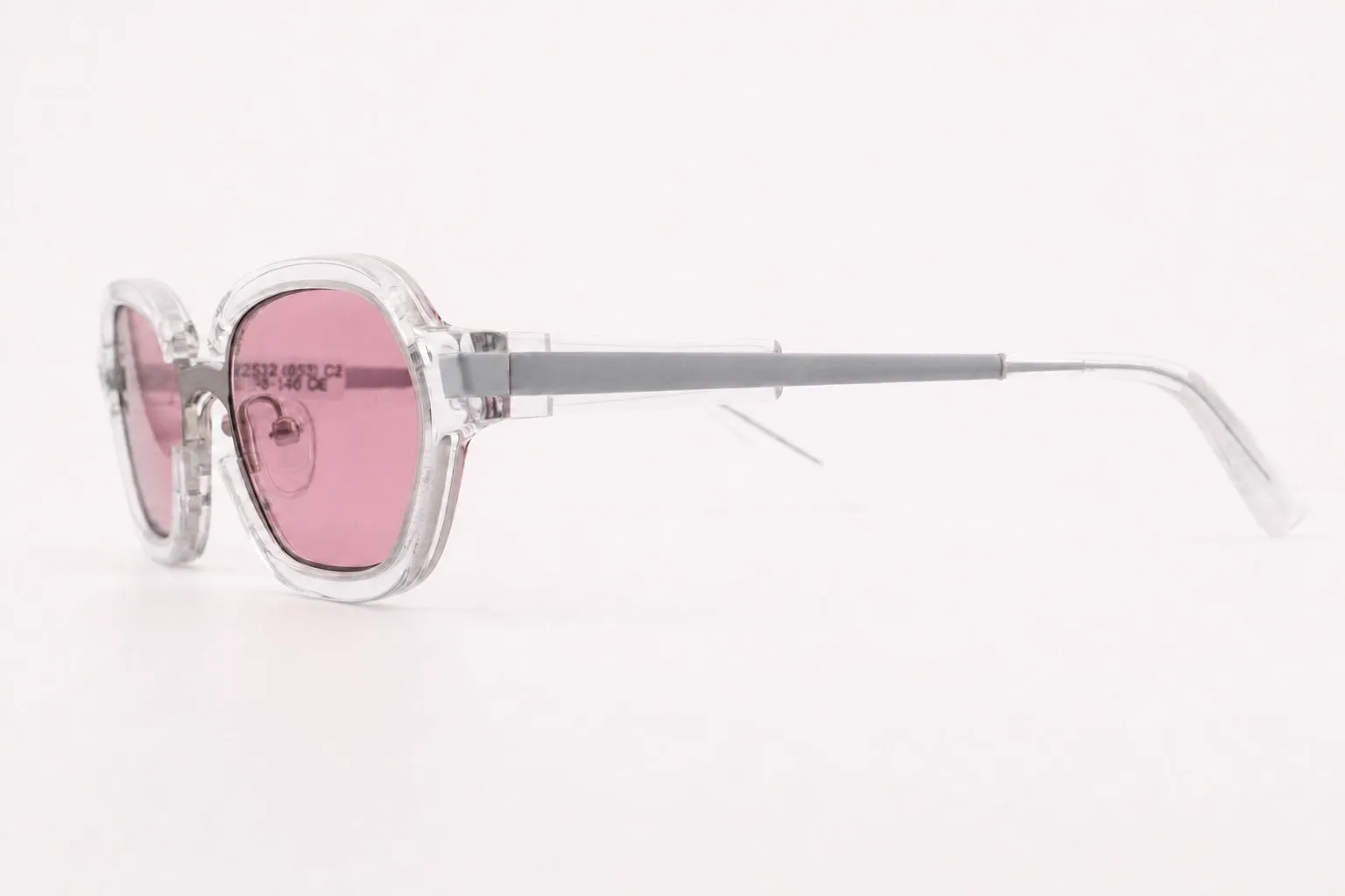 Clear crystal frame with rose lens, side view.