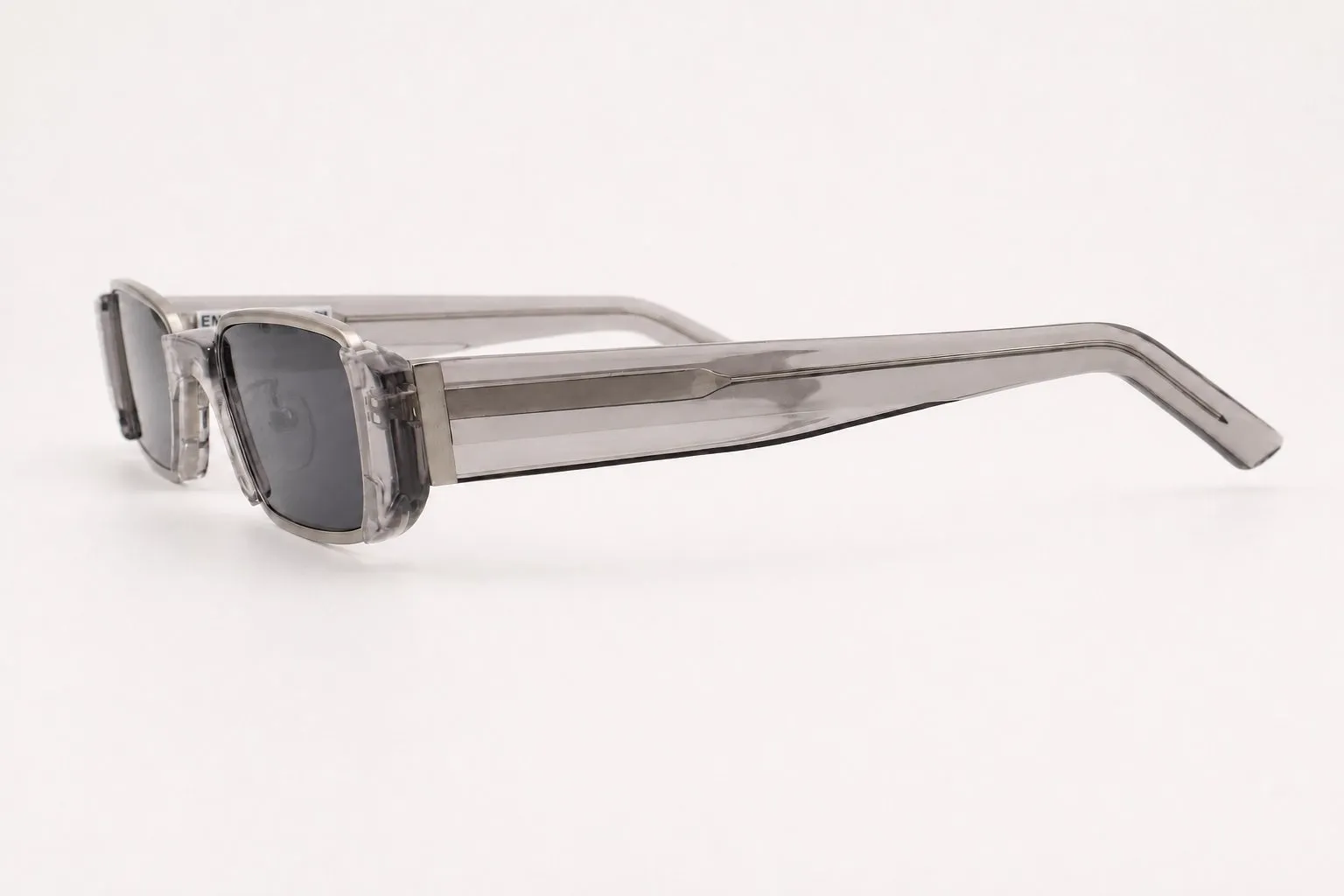 Grey crystal rectangular sun frame, side view.