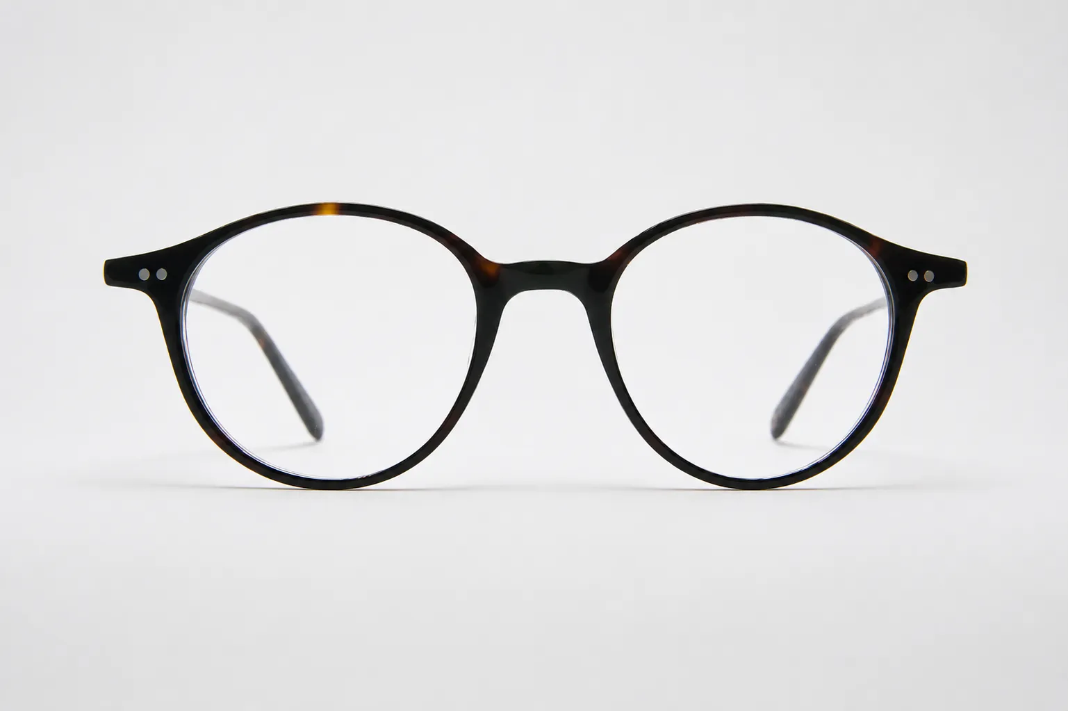 Round optical frame, tortoise.